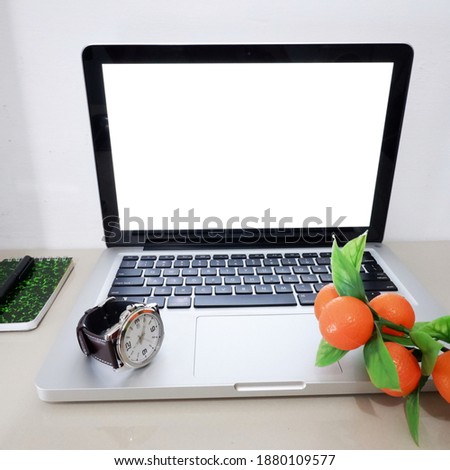 Notebook Laptop Mockup Realistic on the Desk