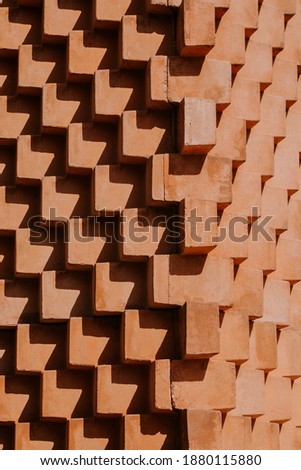 A brick wall pattern and wallpaper