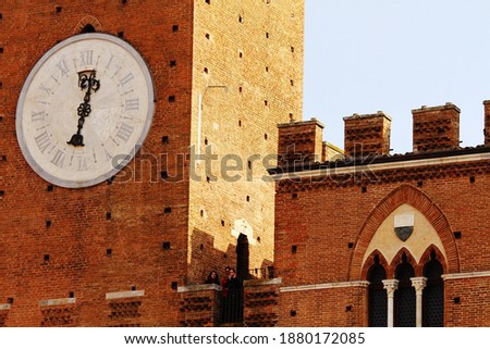 Travel to Siena, a city in central Italy’s Tuscany region, is distinguished by its medieval brick buildings.