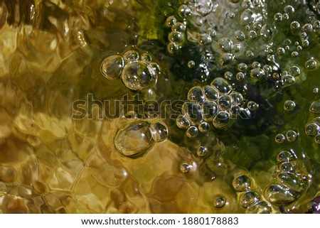 Bubbles in the water. Water background.