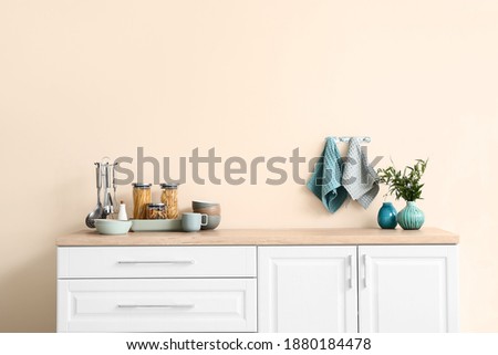 Set of utensils on kitchen counter Royalty-Free Stock Photo #1880184478