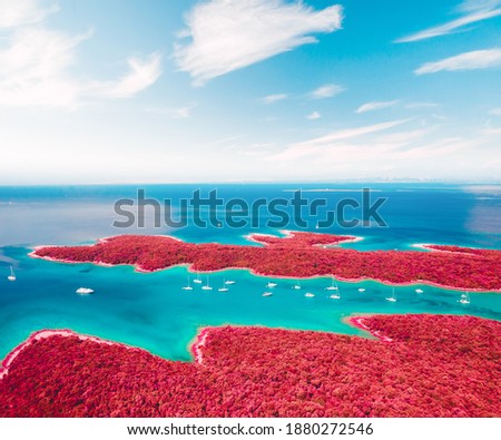 Fantastic color infra-red lagoon on sunny day. Location Kvarner Gulf, Punta Kriza, Cres island, Croatia, Europe. Drone photography. Artistic style picture. Art photo wallpaper. Wonders of the world.