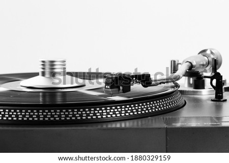 Close up shot Old turntable with Black and white Royalty-Free Stock Photo #1880329159