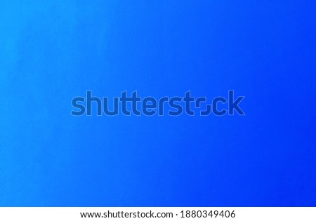 Abstract paintbrush background, paintbrush, blue wall. Blue walls from thin colors to dark blue. Classic blue cement smooth background Wall painted with Pantone color background of the year.