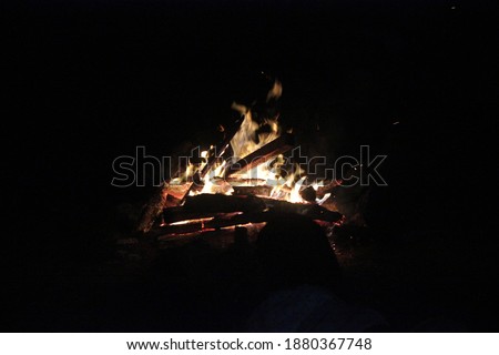 a photo of a brightly lit bonfire