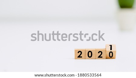 year 2020 changing to 2021 in wood cubes new year 