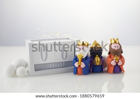 Happy Epiphany day, three kings day. Calendar with three kings on white background Royalty-Free Stock Photo #1880579659