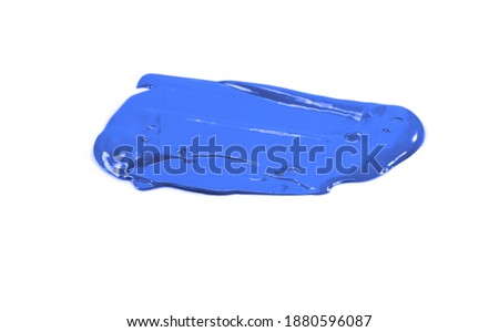 Grunge brush strokes paint. The puddle of  blue paint spill isolated over the white background. Paint Puddle Spill.