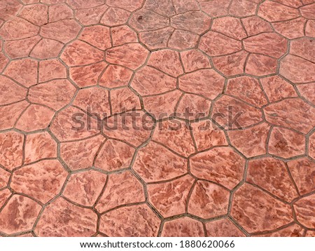 Orange stamp concrete floor texture pattern background 