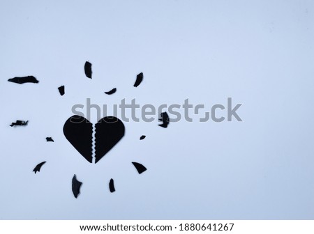 Broken heart. Black heart shape