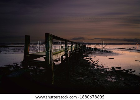 Sunset at the pier in culross, fife, scotland.