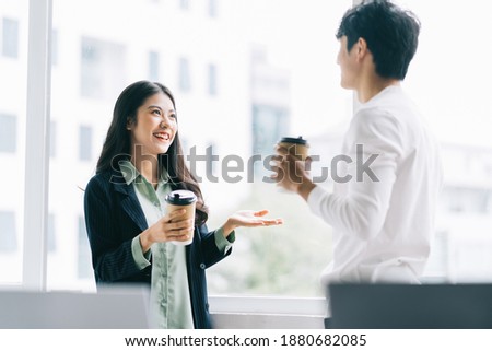Businessman and businesswoman are discussing each other during lunch break
 Royalty-Free Stock Photo #1880682085