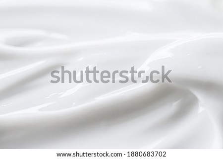 Pure white cream texture as abstract background, food substance or organic cosmetics Royalty-Free Stock Photo #1880683702