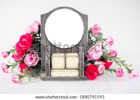 Perpetual calendar with cut-out space for text, picture, photo or date of month with bouquet of roses on white background: spring holidays, mother's day, international women's day,  Valentine's day