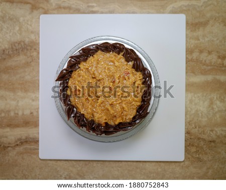 Top view of a  small German chocolate cake.