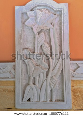The limestone carved into a tree pattern makes for a beautiful home wall decoration