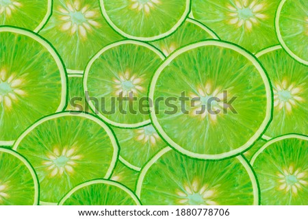 Green lime slices fresh green lemon lime texture background