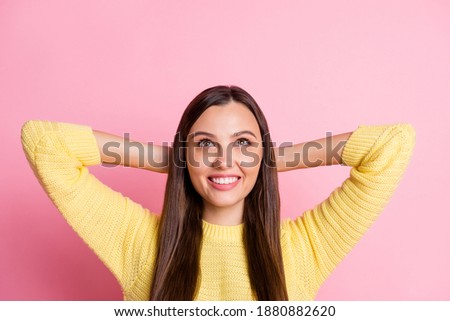 Top high angle view photo of young relaxed smiling cheerful positive girl look up hands behind head isolated on pink color background