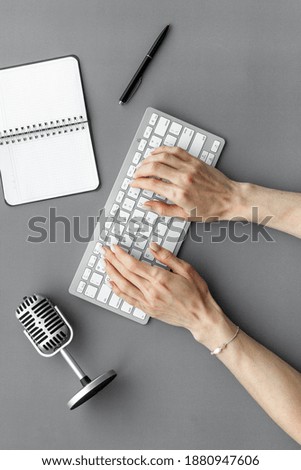 Blogger and streamer job with microphone on table, top view
