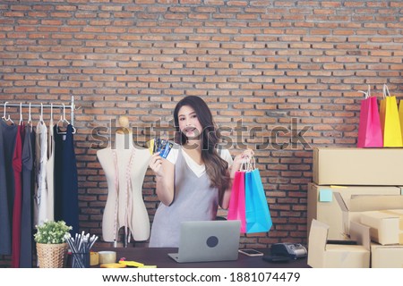 Shopping woman holding shopping bags background, online sales.