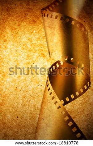 Film strip over grunge texture, may be used as background