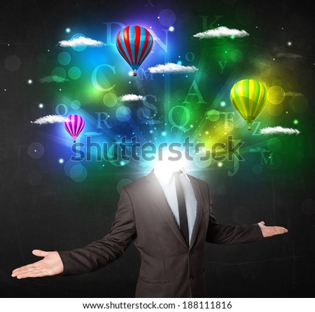 Man in suit with glowing dreamy cloudscape concept