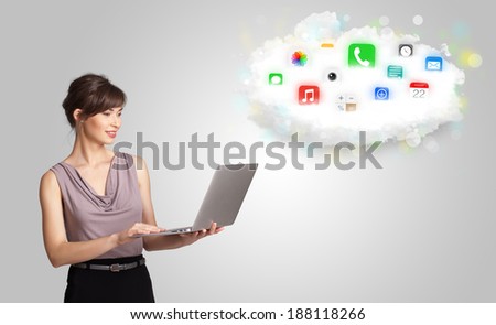 Young woman presenting cloud with colorful app icons and symbols concept