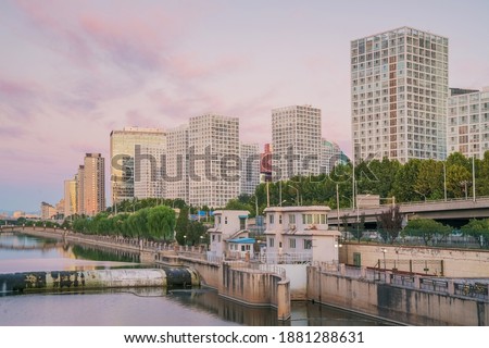 Modern architecture skyline and ancient canal scenery of Jianwai CBD in Beijing, China