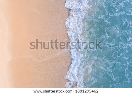 (Top view) Aerial view drone over beach sea. Beautiful sea waves. Beach sand and amazing sea. Summer sunset seascape. Phuket Thailand Beach. Water texture. Top view of the fantastic natural sunsets Royalty-Free Stock Photo #1881295462