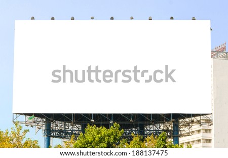 large blank billboard on road with city view background