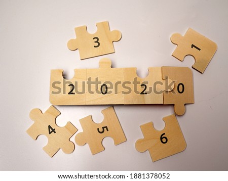 Picture of wood puzzle with number to celebrate 2021 new year