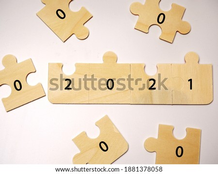 Picture of wood puzzle with number to celebrate 2021 new year
