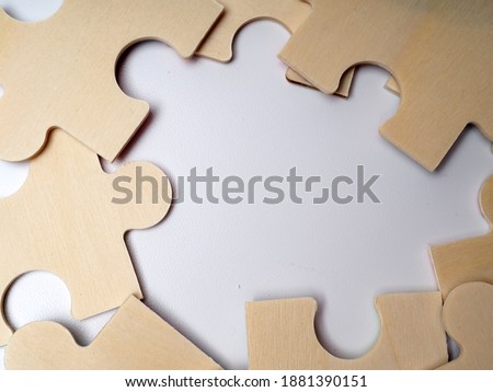 picture of wooden puzzle, a game that also for kids educational 