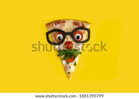 pizza slice as a funny man in glasses on yellow background isolated