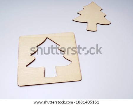 Picture of wooden kids educational game for introducing shape of any object such as plant, trees, animal, etc
