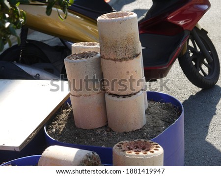 This is a picture of briquettes, which are coal fuels used in Korea, and discarded.