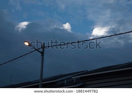 street light lamppost against the sky
