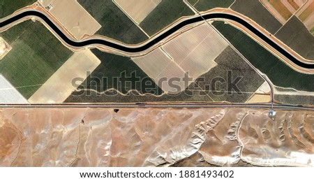 the last frontier, United States, abstract photography of relief drawings in  fields in the U.S.A. from the air, Genre: Abstract Naturalism, from the abstract to the figurative,  Royalty-Free Stock Photo #1881493402