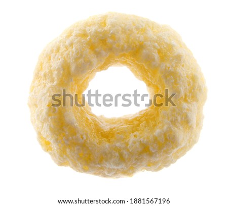 A single corn ring is isolated on a white background.