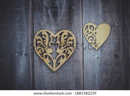 valentine's day background with wooden beautiful heart on wooden background