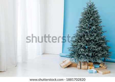 Red decor new year interior Christmas tree with gifts