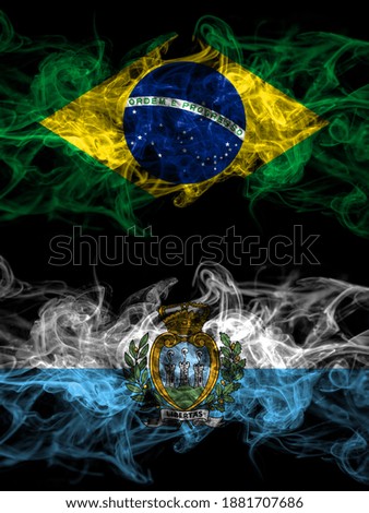 Brazil, Brazilian vs San Marino smoky mystic flags placed side by side. Thick colored silky abstract smoke flags.