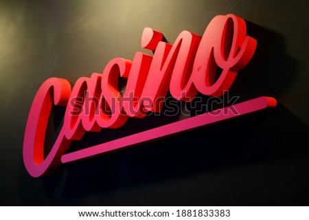 a signboard in cursive that reads Casino