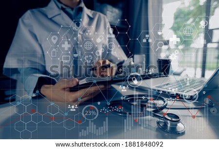 Double exposure of healthcare And Medicine concept. Doctor using digital tablet and modern virtual screen interface icons, blurred background.