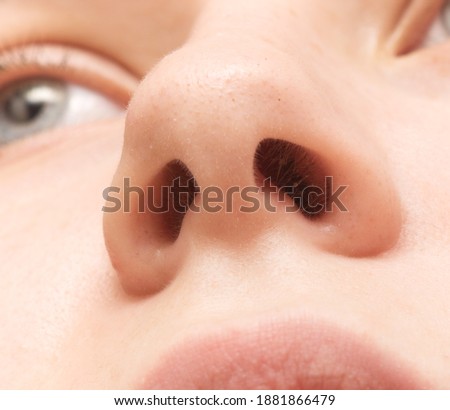 Close up shot of human nose, macro Royalty-Free Stock Photo #1881866479