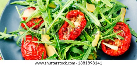 Summer Italian salad with arugula and sun dried tomatoes