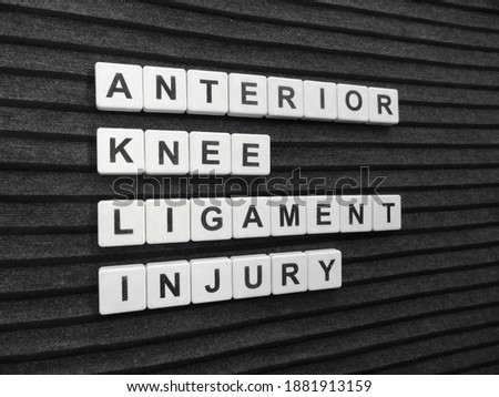 Anterior Knee Ligament Injury, word cube with background.
