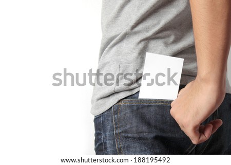Blank card with copy space in a pocket of jeans.