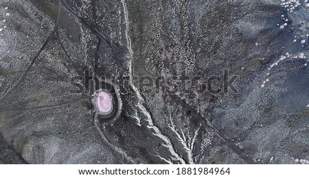 The first cell, United States, abstract photography of relief drawings in  fields in the U.S.A. from the air, Genre: Abstract Naturalism, from the abstract to the figurative, 