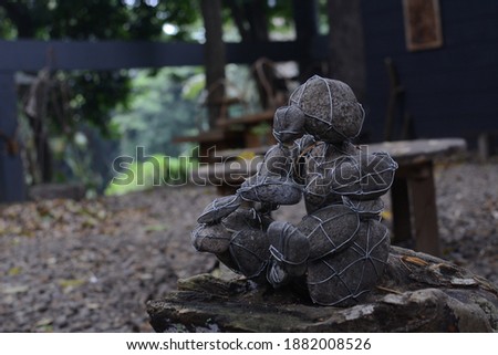 uniquely arranged rock pile with blur background.